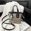 Los Bolsos Cubo Son Populares Este Año, Bolsos de Mano de Alta Calidad para Mujer, Nuevos Bolsos de Hombro y Cruzados Versátiles de Moda Retro
