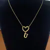 Collar de Acero de Titanio con Colgante de Corazón de Gama Alta y 26 Letras Inglesas para Mujer, Cadena para Clavícula con Apellido, Nicho de Lujo Ligero, Celebridad de Internet para Mejor Amiga