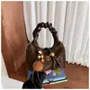 Bolso de mano retro de gamuza de nicho para mujer, nuevo bolso cruzado versátil de moda 2026 con correa de cadena, bolso de hombro con forma de albóndiga