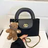 Bolso de mano de alta gama para comercio exterior, nuevo bolso cubo retro de nicho estilo coreano, elegante bolso de hombro, moderno bolso cruzado