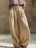 Pantalones de verano nuevos de mujer transfronterizos europeos y americanos, color liso de algodón y lino, moda casual holgados, bolsillo artístico, cintura elástica, pantalones de pierna ancha