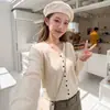 Cárdigan de punto con botones irregulares y cuello en V para mujer, nuevo diseño primavera y otoño 2026, top tipo chaqueta suéter fino de corte holgado