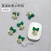 2026 Nuevas Decoraciones de Aleación para Uñas de Navidad Mini Moños de Colores Cascabeles Decoración Dorada y Plateada para Uñas Pedrería