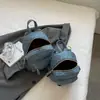 La popular mochila casual simple y a la moda para ir al trabajo de este año 2023, bolso para mujer, mochila portátil con bordado de hilo de rombos