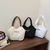 Bolso de hombro de lona para mujer 2026 nuevo modelo simple versátil bolsa tote gran capacidad bolso de mano para ir al trabajo bandolera casual