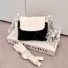 Bolso de mano de tres capas con estampado de estrellas altamente atractivo y gran capacidad, adecuado para maquillaje, cámaras instantáneas y teléfonos móviles