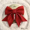 Venta al por mayor de fábrica Accesorios de Navidad Adornos forma tridimensional Adornos de pared Lazo Colgantes de árbol de Navidad Suministros de decoración
