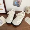 Zapatillas de entrenamiento alemanas de lunares para mujer, nueva colección primavera/otoño 2026, zapatillas blancas transpirables, zapatillas deportivas casual versátiles