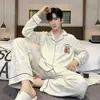Pijama masculino de algodão nuvem com estampa de desenho animado, novo conjunto de loungewear para primavera e outono, com mangas compridas e calças compridas, caimento solto, pode ser usado como roupa externa