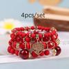 Pulsera de borlas con colgante de amor hueco multicapa de estilo bohemio de venta caliente europeo y americano, juego de joyería multicapa con cuentas de vidrio