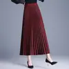 Saia plissada elegante e brilhante para mulheres, novo estilo outono e inverno 2026, saia longa de cintura alta que emagrece com caimento estiloso e barra completa, moderna