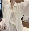 Camisa Minimalista de Color Sólido con Solapa y Mangas Largas para Mujer 2026 Verano Nueva Prenda Exterior Versátil de Alto Nivel para el Trabajo
