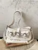 Bolso bandolera retro de moda para mujer, nuevo bolso de verano 2026 de nicho de alto valor con tachuelas y hebilla de cinturón, bolso de hombro