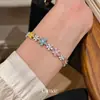 Flores de Colores Dispersas Flor de Hielo de Diamante de Colores Pulsera de Flor de Circonita Corte de Flor Pulsera de Lujo Ligero de Nicho Joyería de Mano de Alta Gama para Mujeres