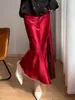 Falda satinada dorada estilo francés para mujer, primavera y otoño, de cintura alta, con abertura, empalme de encaje, brillante, adelgazante, línea A, falda de longitud media