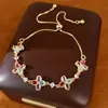Pulsera de flor de trébol de circonita, sensación de lujo ligero de nicho de alta gama, joyería de moda exquisita y versátil al por mayor