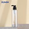 Xumin en stock 300-500MLPET transparente/esmerilado botella con bomba de presión botella de emulsión de plástico inyección de mercurio negro botella vacía