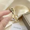 Broche de Micrófono Metálico Personalizado para Mujer, Pin de Alta Gama de Moda con Diseño de Nota Musical, Accesorio Creativo para Suéteres y Trajes