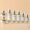 Artículos de Stock con Veta Plateada Set Starlight Botella 30g Tarro de Vidrio para Crema 120ml Botella para Loción Productos de Empaque Cosmético Disponibles para Venta al por Mayor