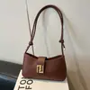 Moda Primavera 2025 Bolso Baguette Moderno y Personalizado Tendencia de Moda Diseño de Nicho Bolso de Hombro Cruzado con Textura para Mujer