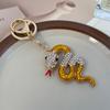 Llavero de coche con diseño de serpiente del zodiaco y diamantes para mujer, bonito colgante de bolso de metal, regalo al por mayor