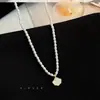 Colar de Pérolas Sintéticas e Madrepérola para Mulheres, Pingente de Concha Versátil, Corrente para Clavícula, Novo Design de Nicho 2024 Colar de Pérolas