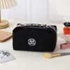 Nuevo neceser tipo bolso de mano de camelia, diseño apto para viajes, bolsa de almacenamiento de alta gama para cosméticos, labiales y llaves
