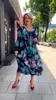 Vestido longo estampado com gola V novo Primavera e Outono 2023 transfronteiriço Moda feminina europeia e americana emagrecedor que reduz a idade moda