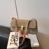 Bolsa de ombro feminina para axila, coleção primavera 2026, moderna e estilosa, com design francês, uma bolsa de mão única e casual