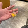 Chaveiro de acrílico transparente com areia movediça de desenho animado, pingente de bolsa, pequeno presente para crianças, decoração de carro