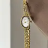 Relógio Pulseira Dourado com Mostrador Estiloso e Requintado, um Relógio de Quartzo à Prova d'Água e Versátil de Alta Aparência para Mulheres