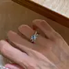 Anillo de Diamante Azul Entrelazado de Glaciar de Gama Alta para Mujer, Lujo Accesible, Dulce Elegante, Anillo de Moda y Versátil