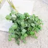 Folhas de Eucalipto Prateadas 5 Galhos Eucalipto Artificial Folhas de Dinheiro Flores Artificiais para Decoração de Casa Display de Janela de Hotel Venda Especial de Casamento