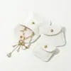 Bolsita de terciopelo con broche a presión personalizada para joyería, bolsa de embalaje para anillos y collares, minibolsa de tela, bolsa de almacenamiento para joyería