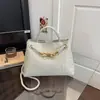Bolsa de mão com textura tecida para mulheres, elegante e versátil, bolsa de ombro única, sensação de alta qualidade, bolsa para deslocamento crossbody, bolsa tote de grande capacidade, transfronteiriça
