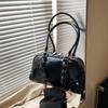 Bolso de bolos portátil de estilo coreano de color liso para mujer, bolso de almohada retro nuevo de 2025, bolso de hombro con múltiples combinaciones.