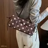 Bolso de trabajo con exquisitos lunares, súper popular en otoño, estilo coreano 2026, elegante bolso de hombro nuevo, de nicho y versátil para mujer