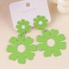 Nuevos aretes sencillos estilo girasol con costuras huecas, versátiles para la oficina, diseño de flor, aretes colgantes para mujer