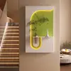 A pintura em arenito da Galeria de Arte Qiaojia oferece uma sensação de luxo leve e de alta qualidade, adequada para decoração de hall de entrada, arte de parede com plantas verdes e pinturas de parede de fundo com luzes.