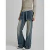 Jeans acampanados casuales versátiles de estilo coreano para mujer, con cintura de cordón y bajo patchwork, diseñados para estilizar y llegar hasta el suelo.