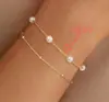 Colar de Trevo de Quatro Folhas com Zircônia Novo Estilo Europeu e Americano para Mulheres, Colar de Flor de Pérola e Concha Atacado, Pulseira de Borboleta com Contas Douradas Atacado