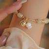 Pulsera de Campana Pequeña Continuada de Jade Hetian Natural Diseño Nicho de Lujo Ligero Elegante Combinable Pulsera para Novia para Mujer en Verano