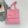 Bolso de Lona de Moda de Nicho 2026 Primavera Nuevo Estilo con Letras para Viajar con Estilo Gran Capacidad Bolso de Hombro Bolso Ligero