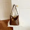 Bolso de hombro de diseño de nicho estilo coreano transfronterizo, moda retro para el día a día, para mujer, color liso, moderno, casual, bandolera tipo cubo