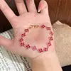 Xiaohongshu Atacado Pulseira de Trevo de Quatro Folhas com Zircônias em Círculo Completo Estilo Ins Colorida Versátil Floral Elegante Joias