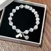 Pulsera de la suerte y auspiciosa de nuevo estilo, fresca y elegante, estilo refrescante, pulsera de borla que trae suerte, versátil para mujeres artísticas