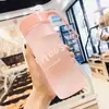 Taza de agua de plástico al por mayor botella de agua deportiva taza de agua alto valor gran capacidad hombres y mujeres taza de agua de celebridad de internet taza portátil para estudiantes