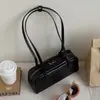 Bolso almohada estilo vintage 2026 modelo nuevo, bolso Boston de bowling de alta gama, bolso de hombro tipo baguette de cuero genuino de moda para mujer