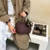 Bolsa bucket transfronteiriça moderna e estilosa para mulheres, coleção outono 2026, cor sólida, alça de corrente, bolsa de ombro, bolsa crossbody e conjunto de bolsas