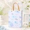 Bolso bolsa de compras bolsa de regalo bolsa de regalo de PP de alta gama estilo ins caricatura estudiante bolsa de jardín de infantes